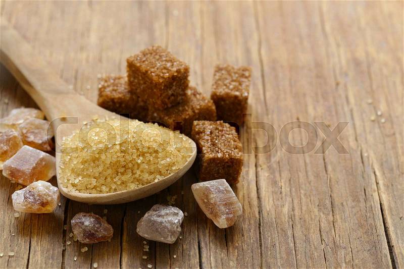 Brown cane sugar (refined sugar and granulated sugar), stock photo