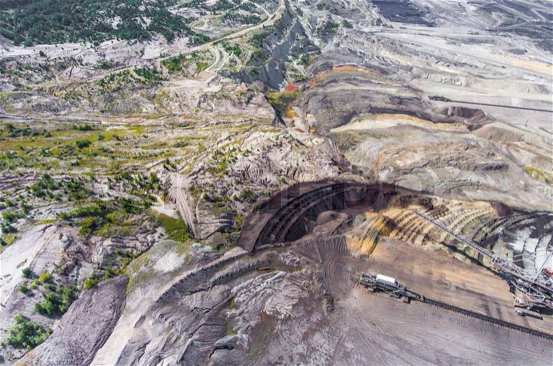 Surface coal mining in Poland. Destroyed land. View from above. Surrealistic landscape, stock photo