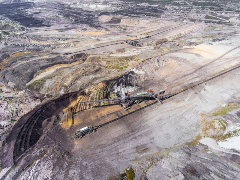Surface coal mining in Poland. Destroyed land. View from above. Surrealistic landscape, stock photo