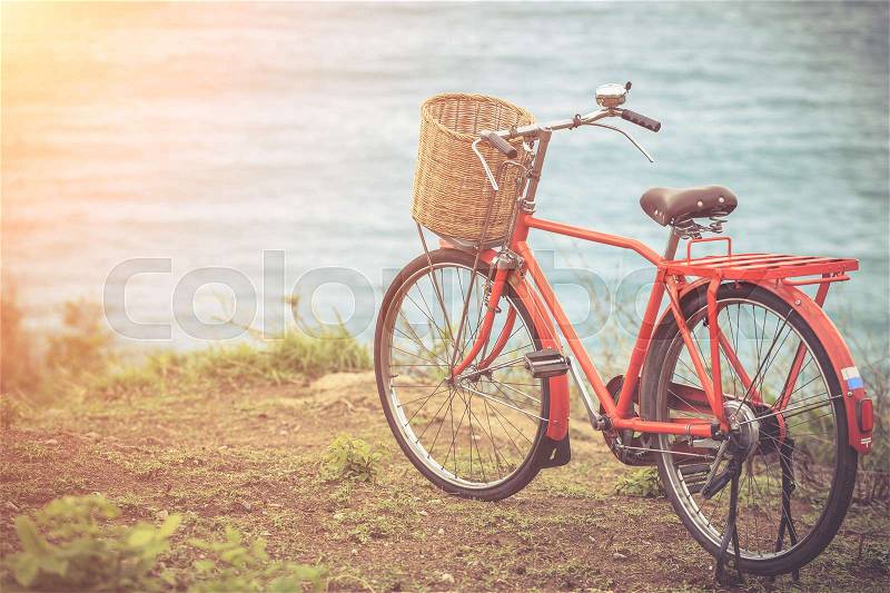 Red Japan style classic bicycle at ocean view point, Vintage filter effect, stock photo
