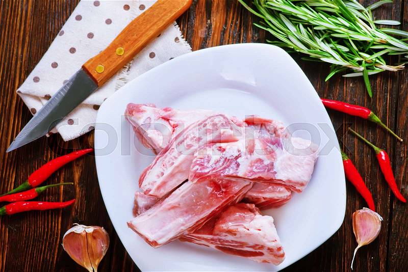 Raw meat with salt and aroma spice, stock photo