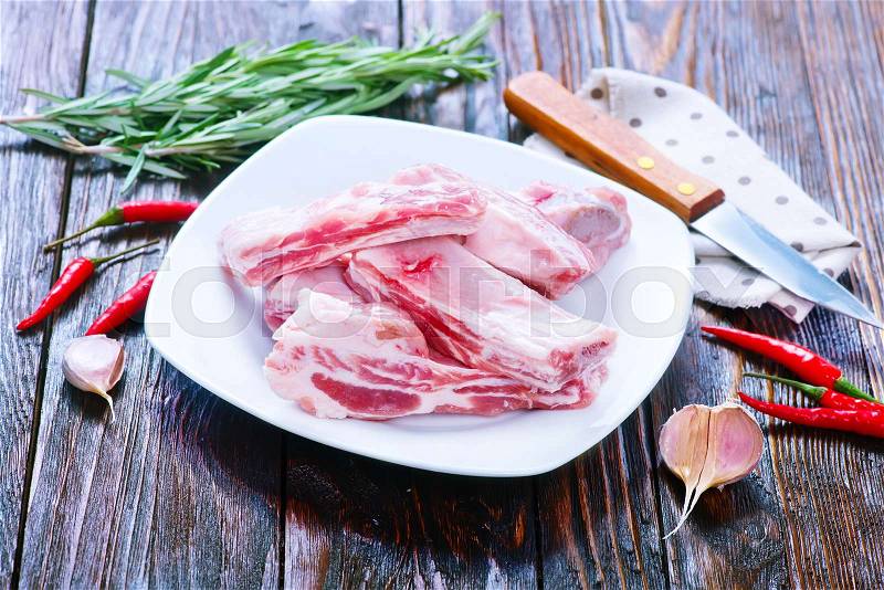 Raw meat with salt and aroma spice, stock photo