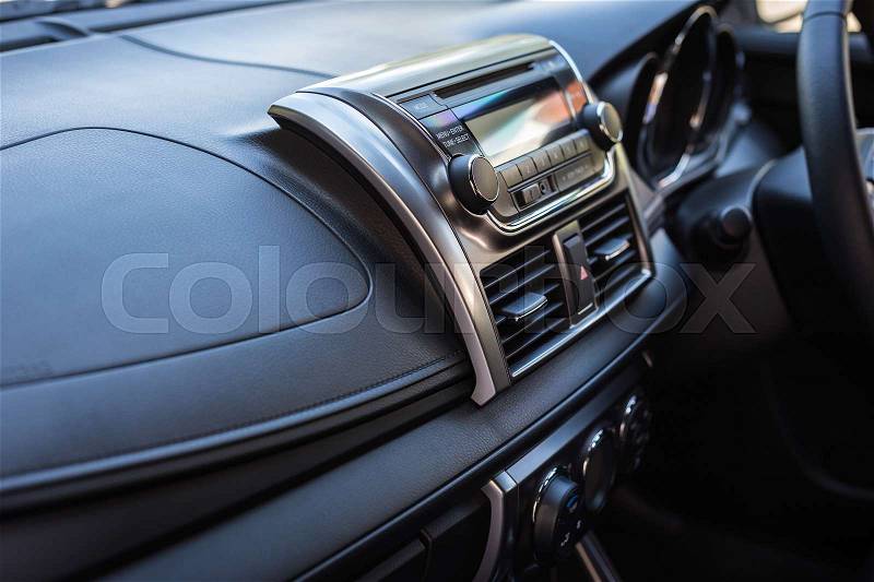 Detail of new modern car interior, Focus on stereo, stock photo