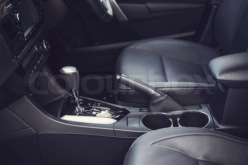 Detail of new modern car interior, Focus on gear, stock photo