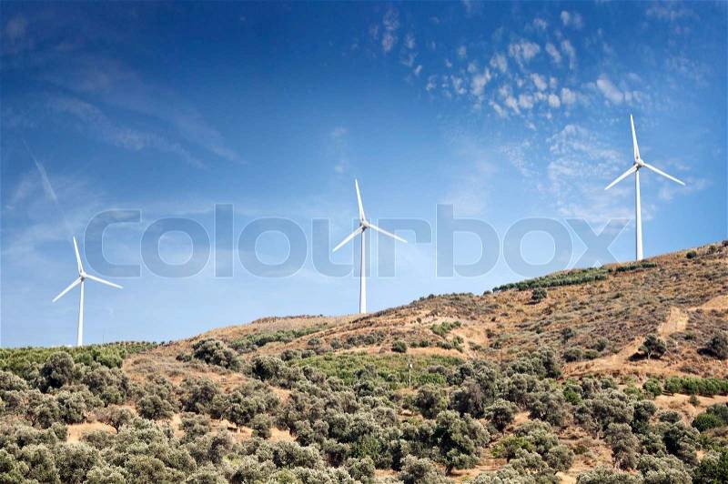 Wind power is the conversion of wind energy into a useful form of energy, such as using wind turbines to make electricity, stock photo