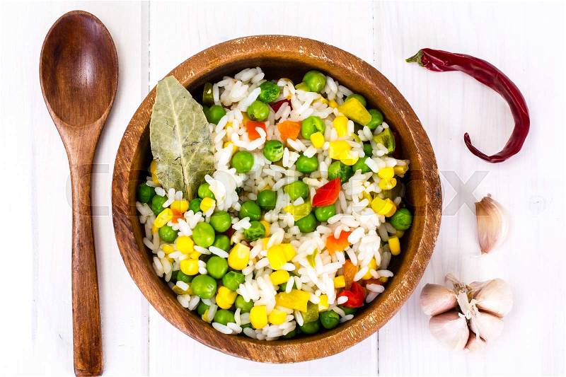 Risotto with Vegetables, Corn and Peas. Studio Photo, stock photo