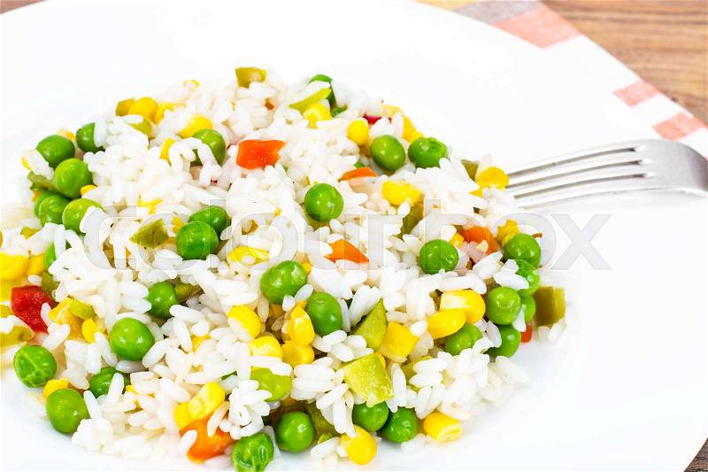 Risotto with Vegetables, Corn and Peas. Studio Photo, stock photo