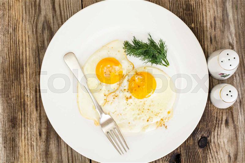 Scrambled Eggs on White Plate Health Food, stock photo