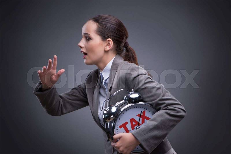 Businessman in late taxes payment concept, stock photo