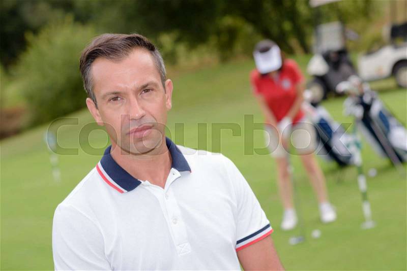 The golf coach, stock photo