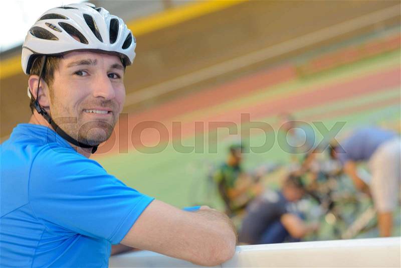 Portrait of man in cycle helmet, stock photo