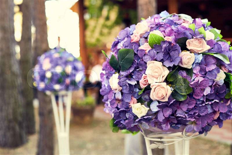 Beautiful decoration of wedding purple flowers. Close-up of flower decoration round shape, stock photo