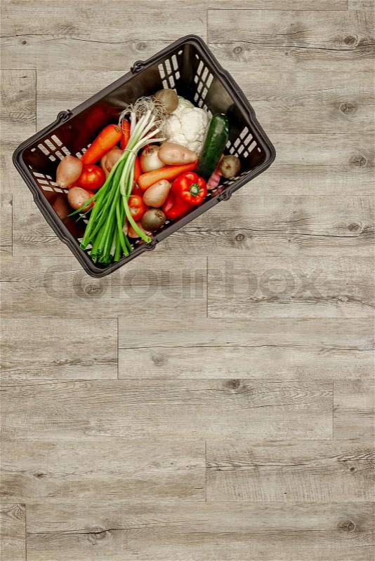A studio photo of a fruit and vegetable basket, stock photo