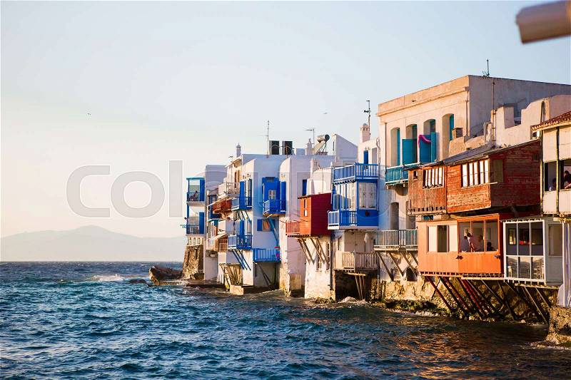 Little Venice the most popular attraction in Mykonos Island in soft evening light on Greece, Cyclades, stock photo