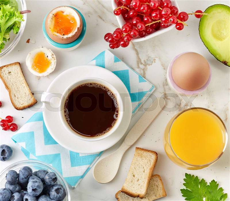 Healthy breakfast products on kitchen table, top view, stock photo