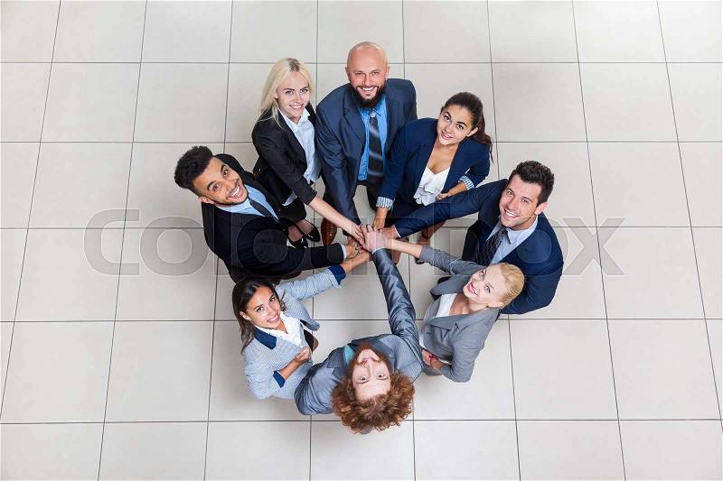 Business People Group Stand In Circle, Businesspeople Team Putting Their Hands Stack Look Up Teamwork Collaboration Top Angle View, stock photo