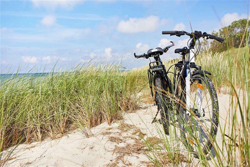 Bicycles tourists traveling in nature on a sunny day, stock photo