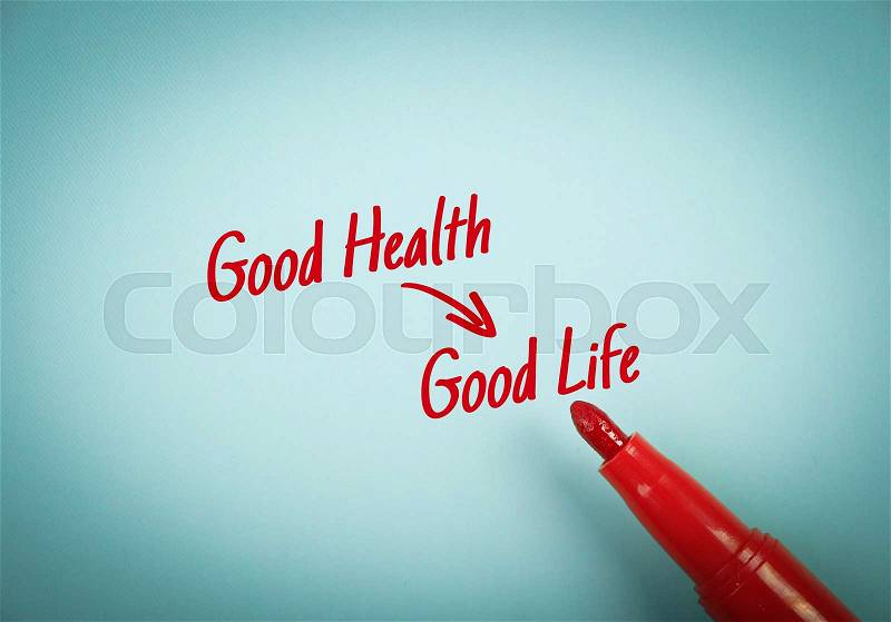 Text Good Health Results Good Life written on blue paper with red mark pen aside, stock photo