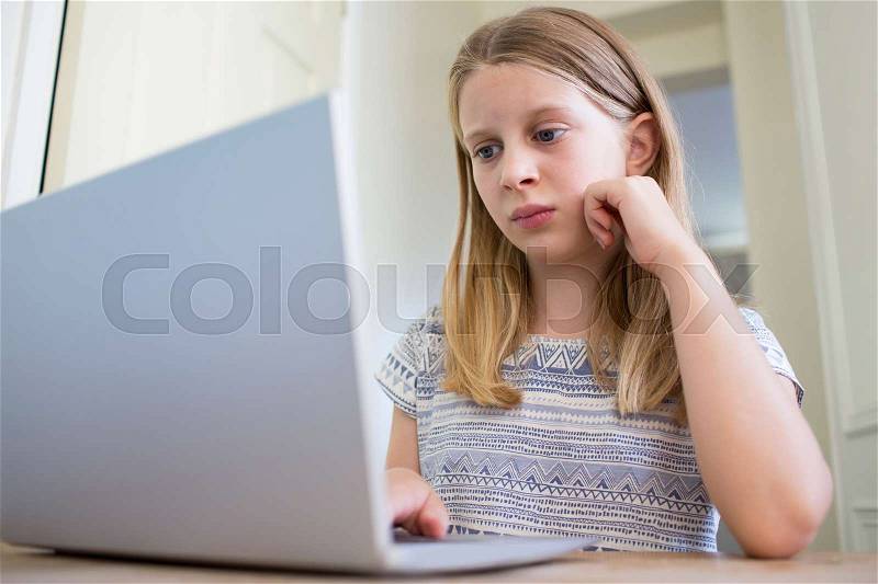 Young Girl Worried About On Line Bullying, stock photo