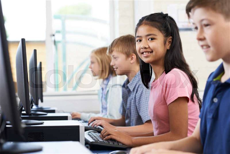 Female Elementary Pupil In Computer Class, stock photo