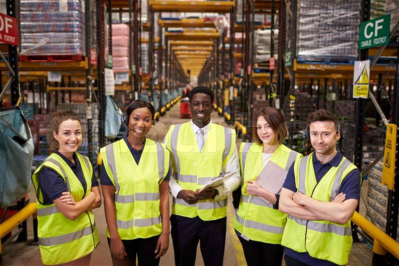 Warehouse staff group portrait, elevated view, stock photo