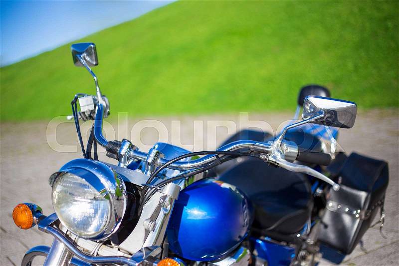 Close up of beautiful blue retro motorcycle, stock photo
