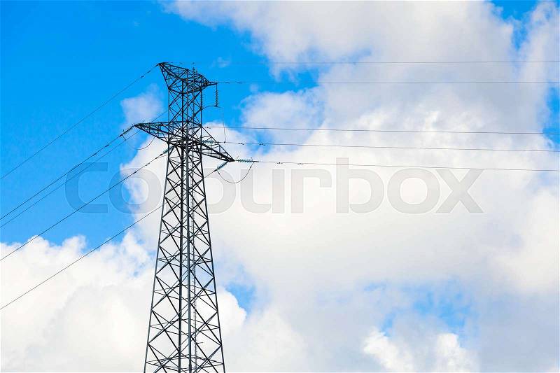 Lattice-type steel tower of high-voltage line. Overhead power line details. The structure used to transmit electrical energy in electric power transmission and distribution, stock photo
