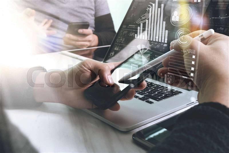 Business team meeting present. Photo professional investor working with new startup project. Finance managers meeting.Digital tablet laptop computer design smart phone using. Sun flare effect, stock photo
