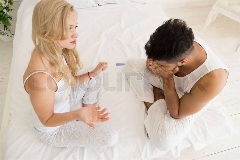 Couple Sitting Bed Argue, Having Conflict Relationships Problem, Sad Negative Emotions Hispanic Man And Woman Top Angle View, stock photo