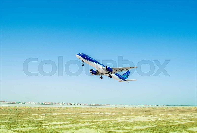 Baku - AUGUST 27, 2016: Airplane taking off on August 27 in Baku, Azerbaijan. Heydar Aliyev airport is the largest in Azerbaijan, stock photo