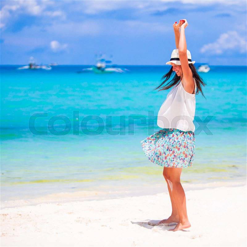 Happy beautiful woman during beach tropical vacation, stock photo