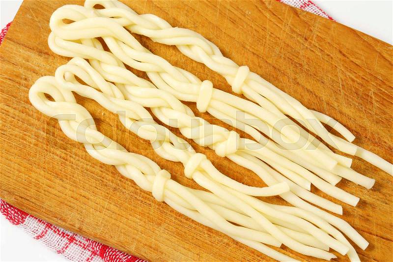 String cheese in the shape of little braids (Korbaciky), stock photo