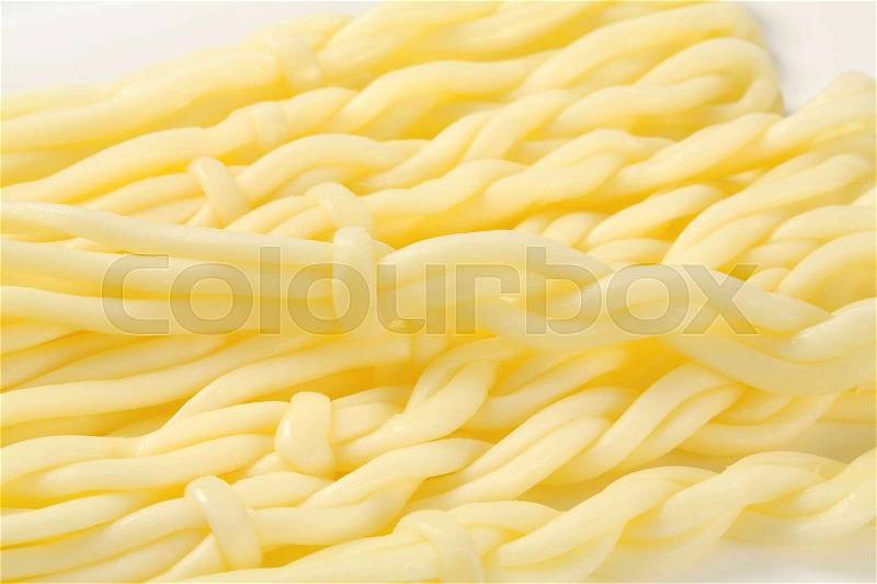 String cheese in the shape of little braids (Korbaciky), stock photo