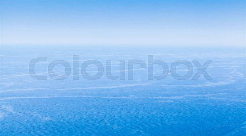 Empty seascape with clear blue sky and still water. Natural background photo, bird eye view, stock photo