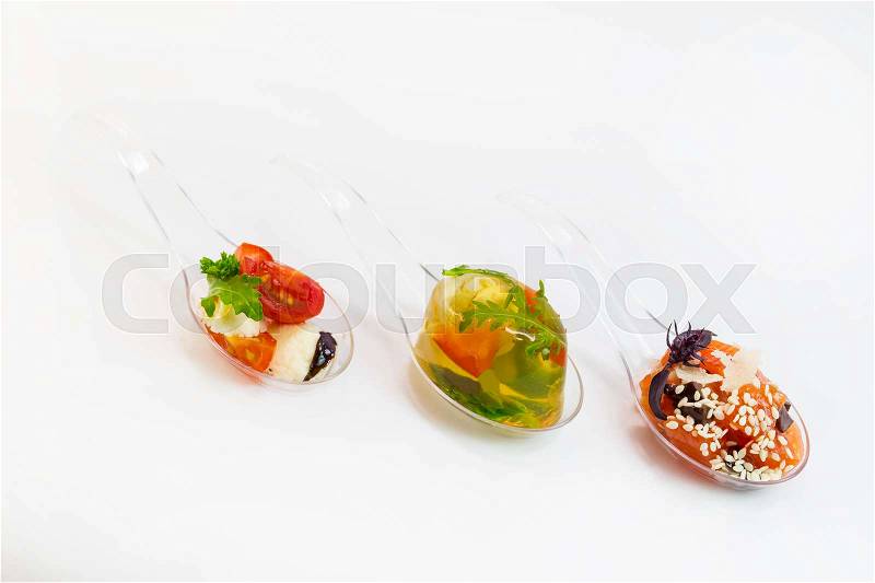 Molecular Cuisine vegetable snacks in plastic spoons, stock photo