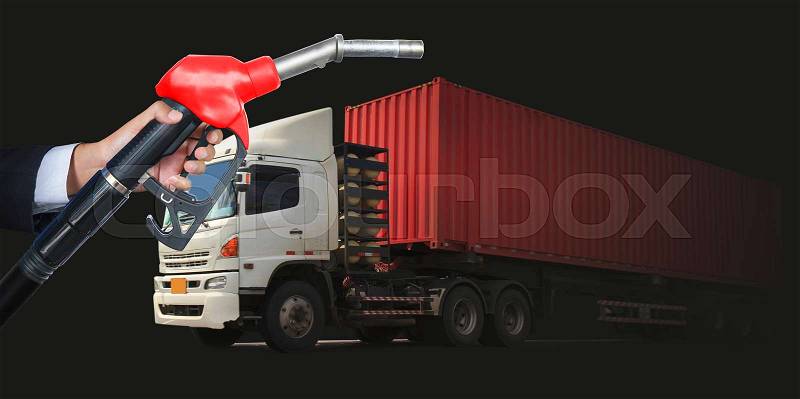 Gas pump for refueling car on gas station with truck in the background, stock photo