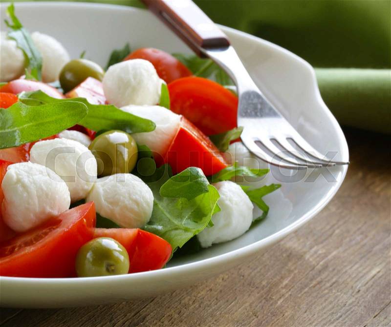Mediterranean salad with olives tomatoes and cheese, stock photo