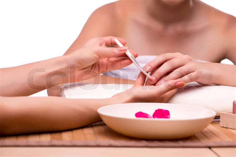 Young woman in nail treatment medical concept, stock photo