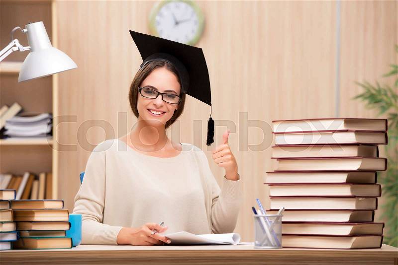 Young student preparing for university exams, stock photo