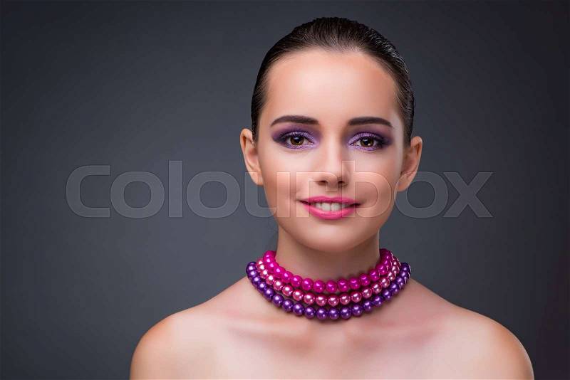 Nice woman with pearl necklace, stock photo