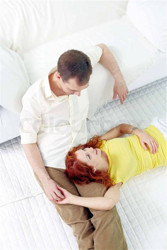 Above view of young couple enjoying each other, stock photo