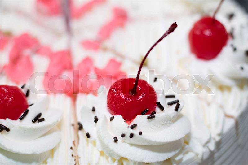 The cherry on the cake, stock photo
