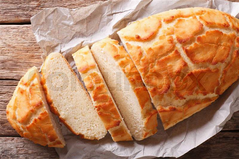 Dutch food: Tiger bread sliced close-up on the table. Horizontal view from above , stock photo