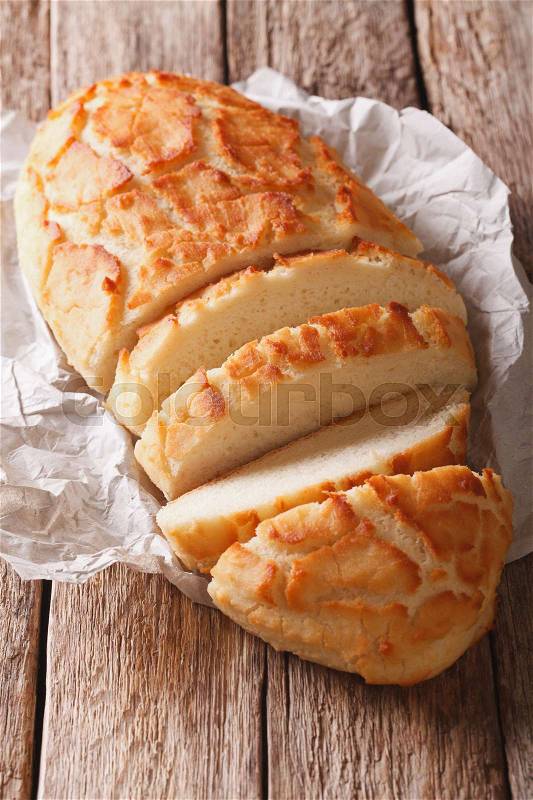 Dutch food: Tiger bread sliced close-up on the table. vertical\, stock photo
