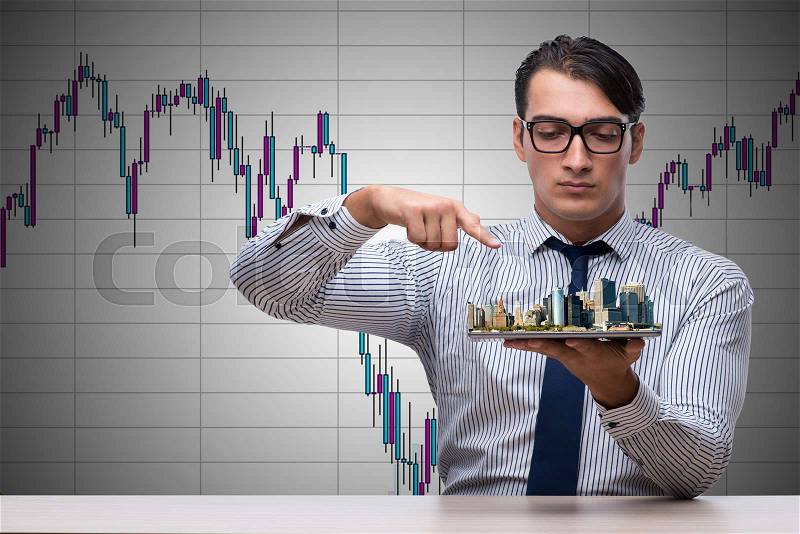 Young architect in urban planning concept, stock photo