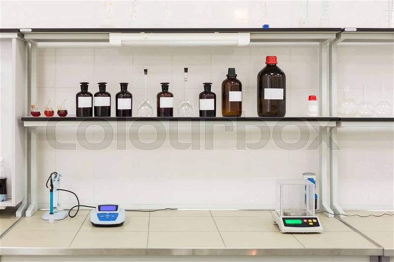 Brown bottles on a shelf in the laboratory. Concept: Research Lab, stock photo