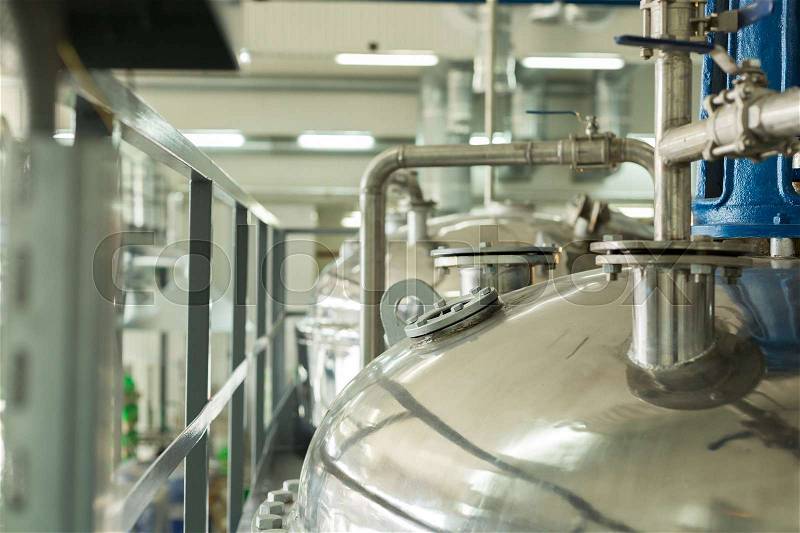 Tanks for chemical mixing on chemical plant. Concept: Manufacturing, stock photo