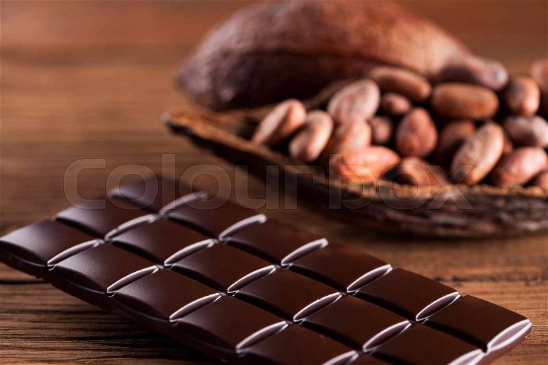 Cocoa pod and chocolate bar and food dessert background, stock photo