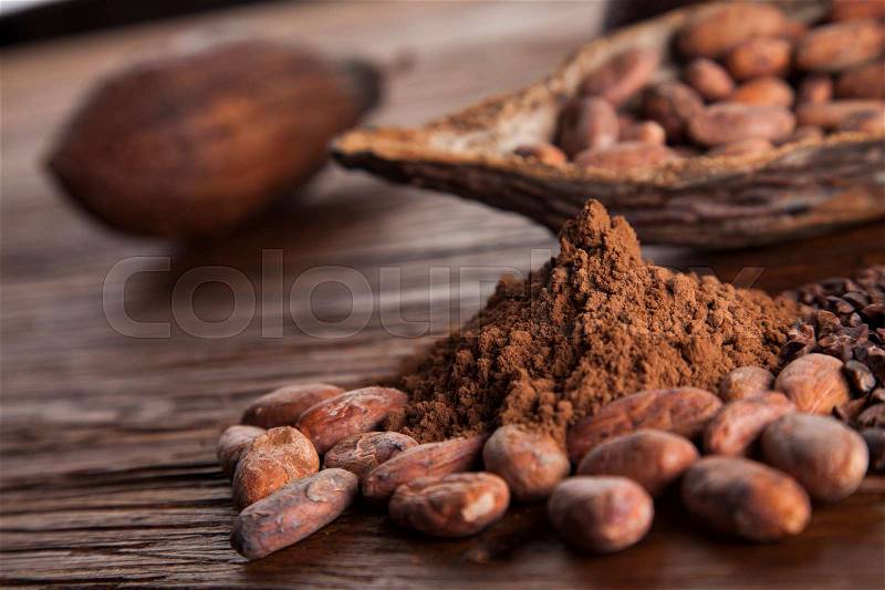 Cacao beans and powder and food dessert background, stock photo