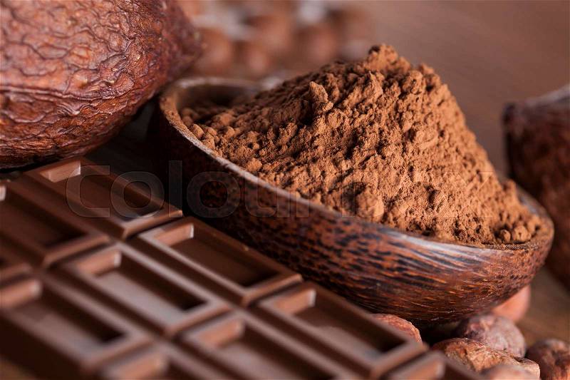 Cocoa pod and chocolate bar and food dessert background, stock photo